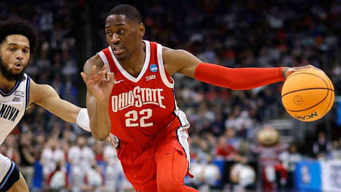 Ohio State Buckeyes guard Malaki Branham (22) dribbles the ball around Villanova Wildcats guard Caleb Daniels (14) in the first half during the second round of the 2022 NCAA Tournament.